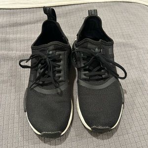 Black and white NMD adidas sneakers